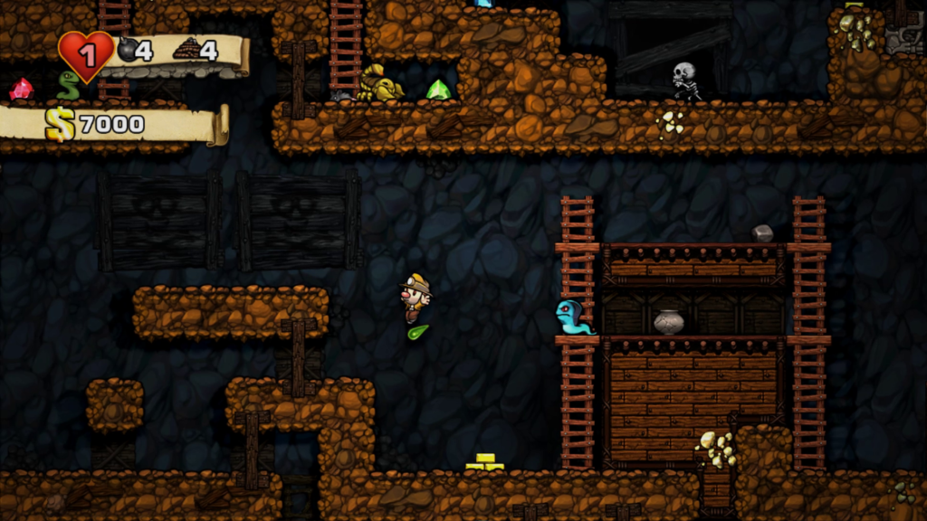 Screenshot. In Level "Minen" springt der Spelunky Guy nach links, unter ihm befindet sich der Gifttropfen einer spuckenden, blauen Schlange.
