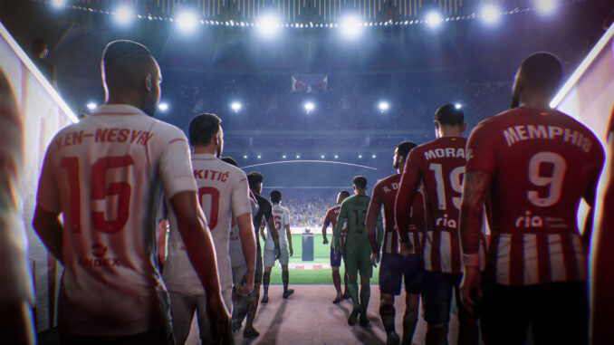 titelbild_fc-24 Screenshot zu EA Sports FC 24. Spieler zweier Mannschaften stehen im Spielertunnel eines Stadions, mit dem Fußballfeld im Hintergrund hell erleuchtet.
