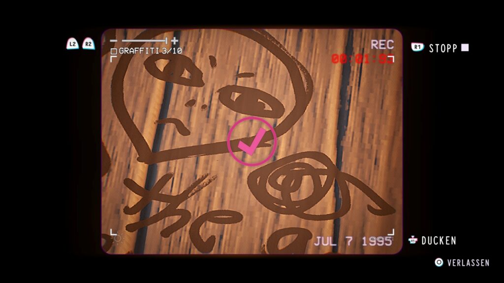 Kamera dicht an ein Graffiti von einem Alienkopf herangezoomt. Die Aufnahme ist gerade fertig, daher ist im Kreis ein Haken, um das neue Graffiti als gefunden anzuzeigen.