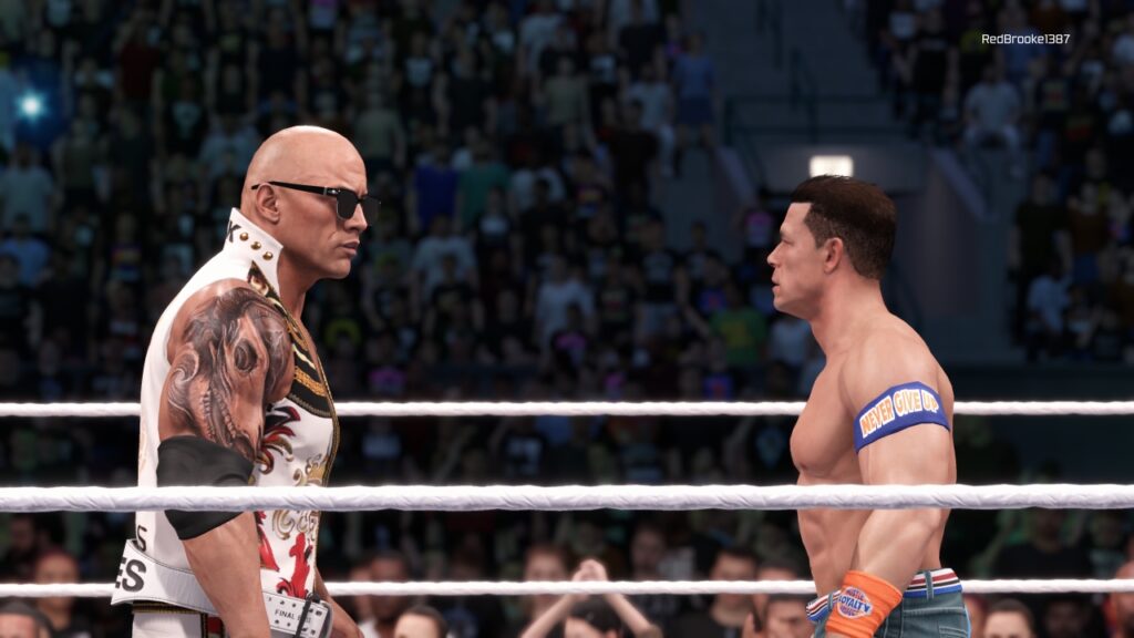 The Rock und John Cena stehen sich im Ring gegenüber, beide scheinen verwirrt zu sein.