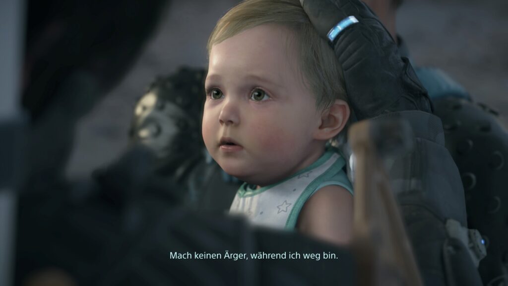 Screenshot Death Stranding 2: Nahaufnahme von Lous Gesicht, Sam hält ihren Kopf. Sam: "Mach keinen Ärger, während ich weg bin."