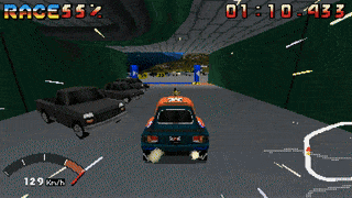 Eine Animation eine orange-grünen Autos, das über die Strecke fährt, srpingt und driftet