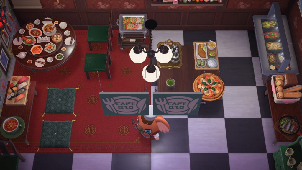 Ansicht von oben mit Asia-Ecke und Tisch mit allerlei unterschiedlichen Gerichten.