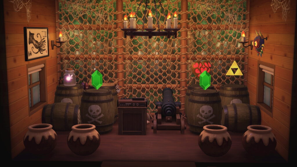 Oberes Stockwerk im Jubiläumshaus, Frontalblick auf das Zimmer. Auf Fässern stehen eine Fee im Glas, eine Schatzkarte, ein Herzcontainer und ein Triforce.