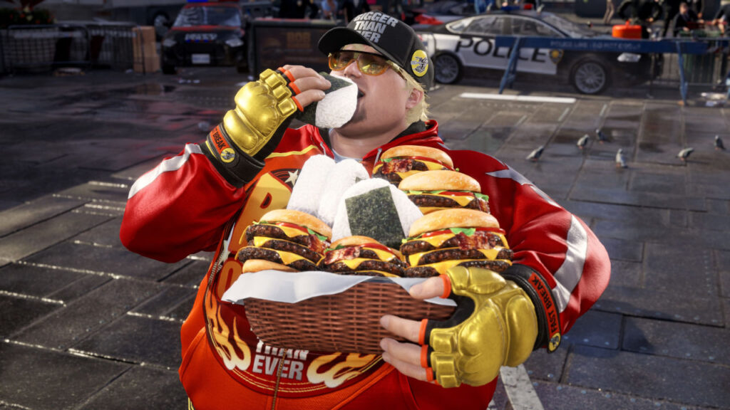 Bob is nach dem Kampf ein Onigiri und hält mehrere weitere Onigir und Burger im Arm