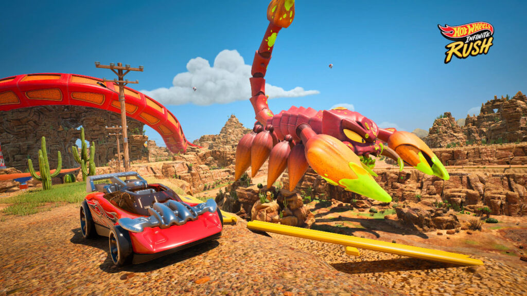 Ein rotes Hot Wheels Auto im Vordergrund mit dem riesigen rot-orangen Skorpion im Hintergrund